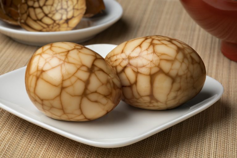 Chinese herbal tea eggs on a plate as snack food